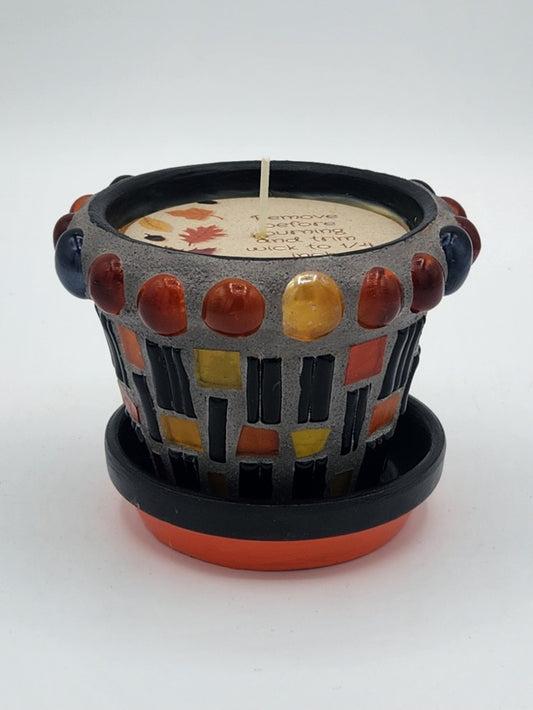 Small mosaic pot with candle