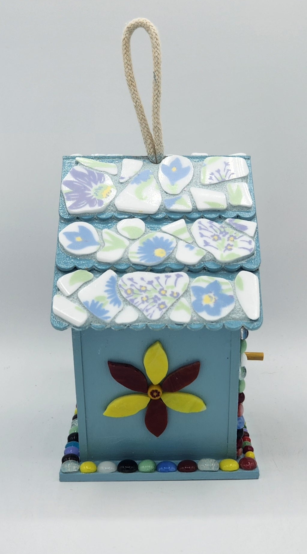 Colorful mosaic birdhouse