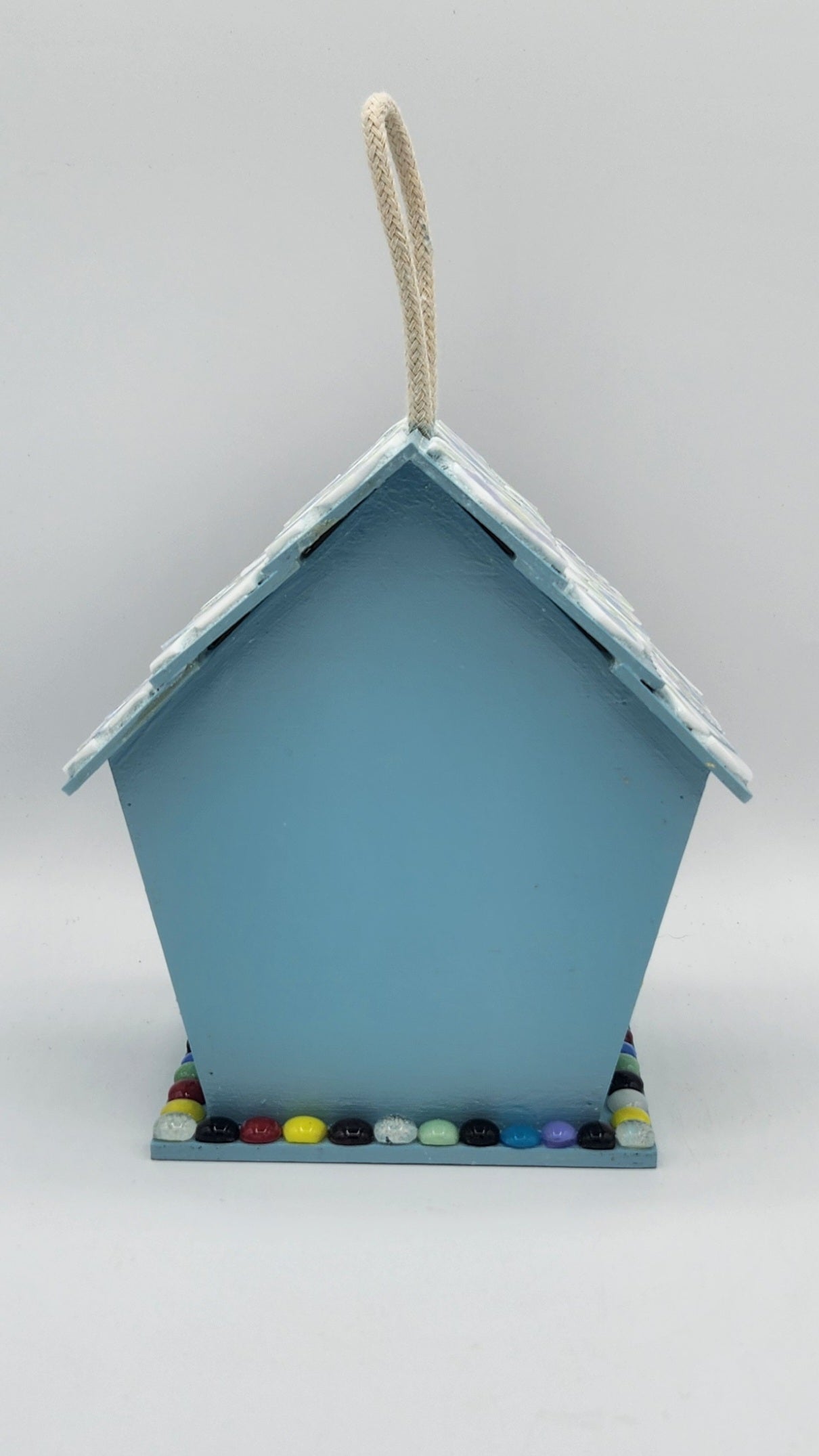 Colorful mosaic birdhouse