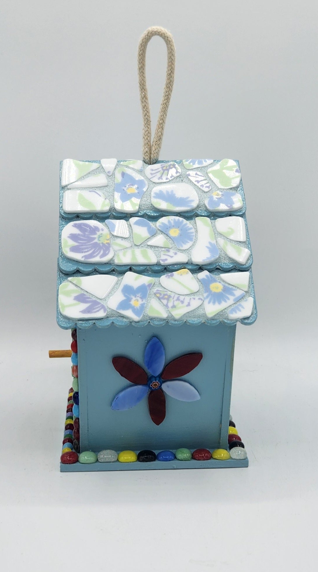 Colorful mosaic birdhouse