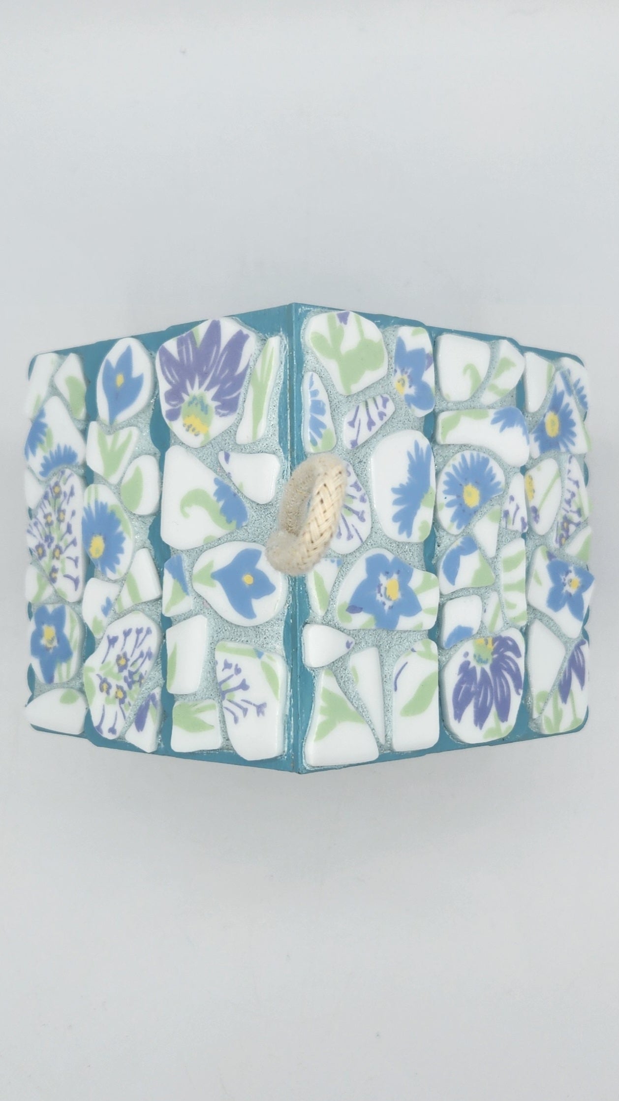 Colorful mosaic birdhouse