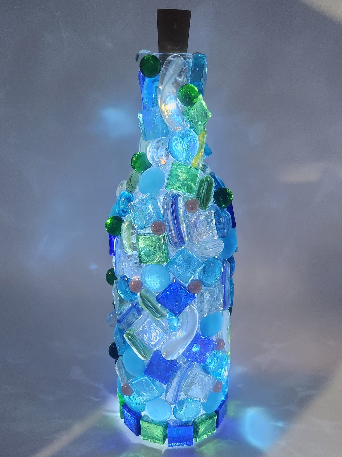 Mosaic lighted wine bottle