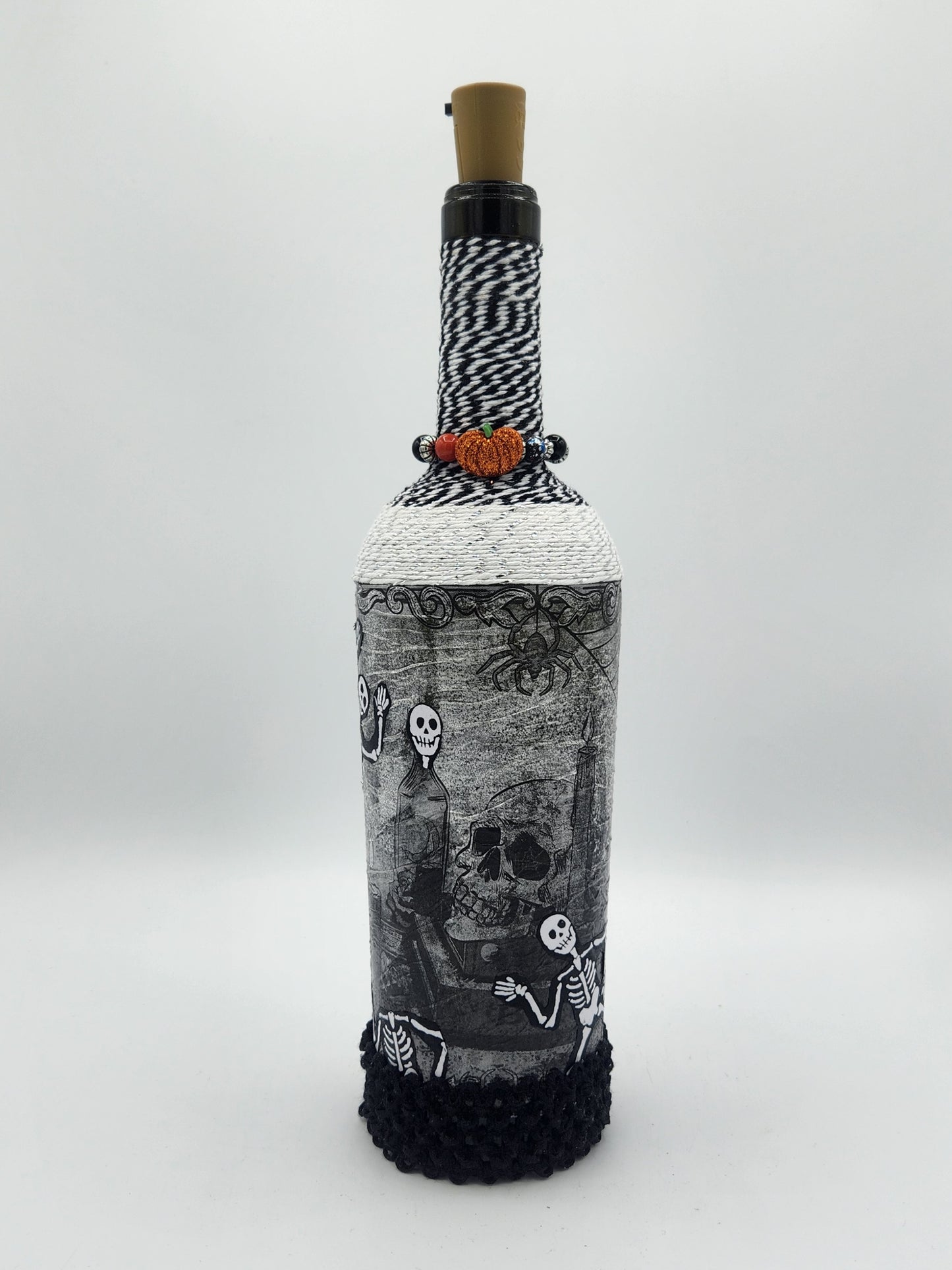 Decorative Halloween wine bottle with fairy lights.