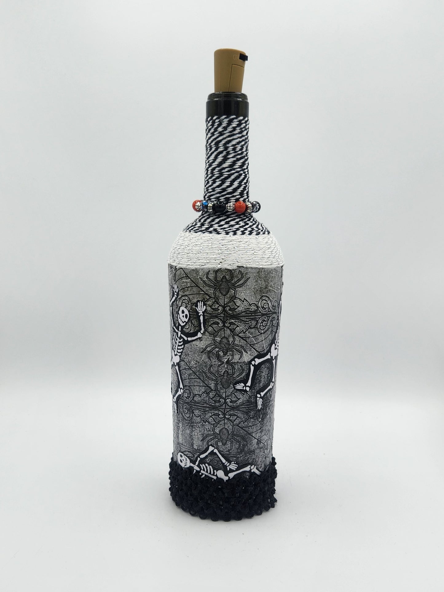 Decorative Halloween wine bottle with fairy lights.