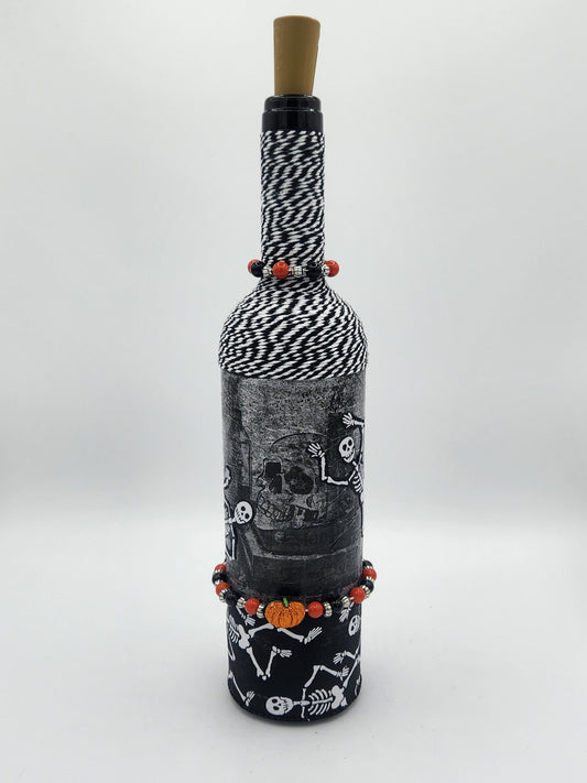 Decorative spooky Halloween wine bottle with fairy lights