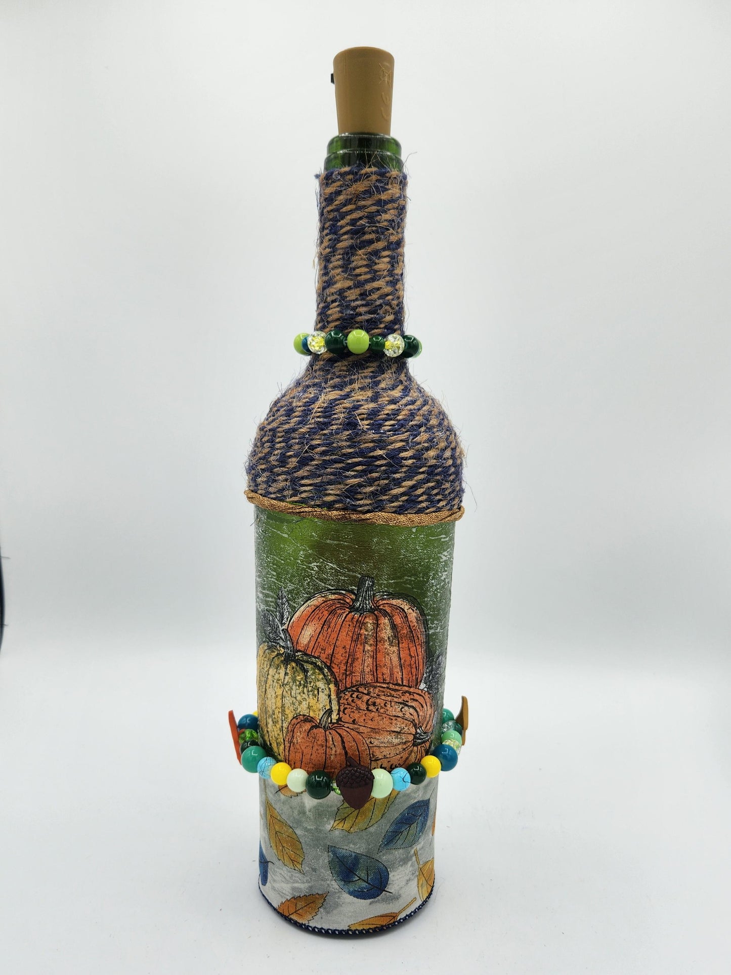 Decorative fall wine bottle with fairy lights