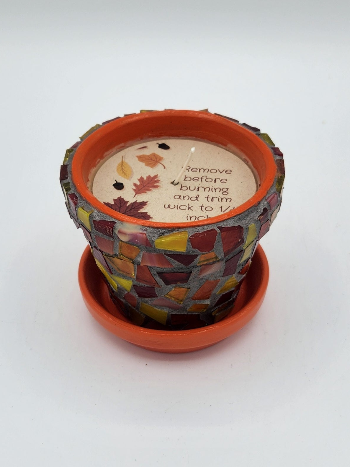 Small mosaic pot with candle