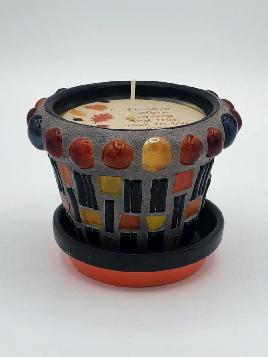 Small mosaic pot with candle