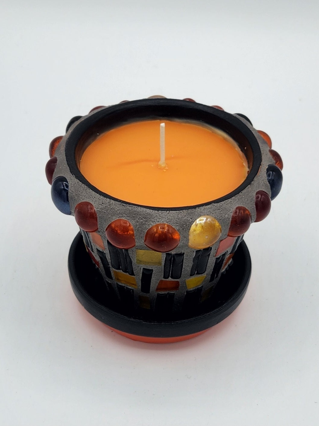 Small mosaic pot with candle