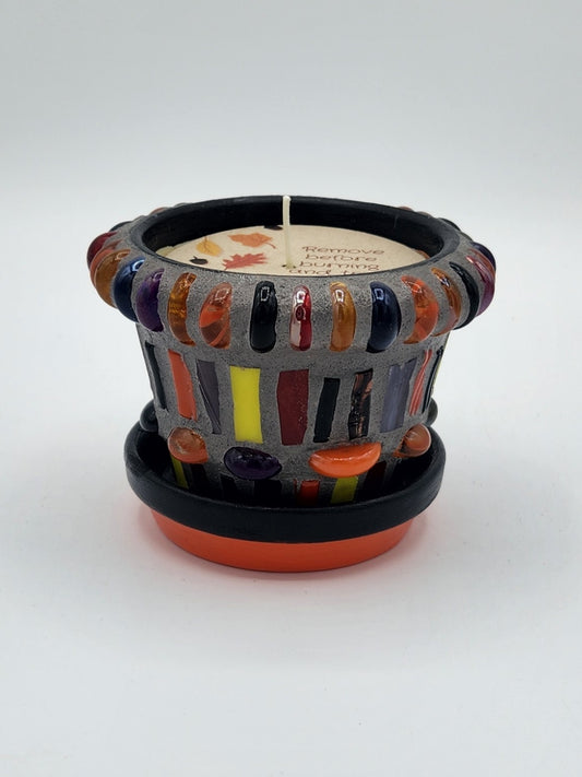 Small mosaic pot with candle