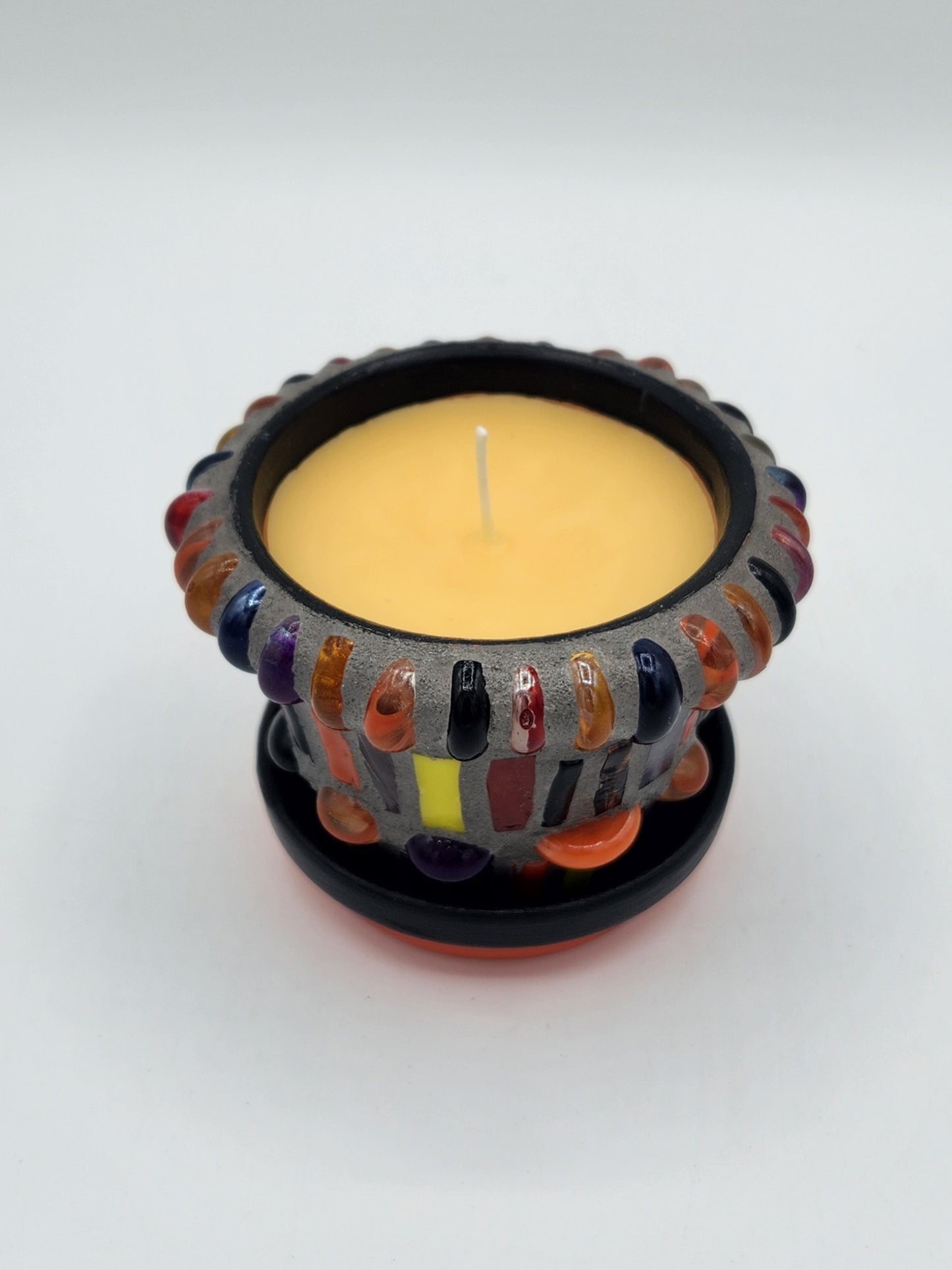 Small mosaic pot with candle