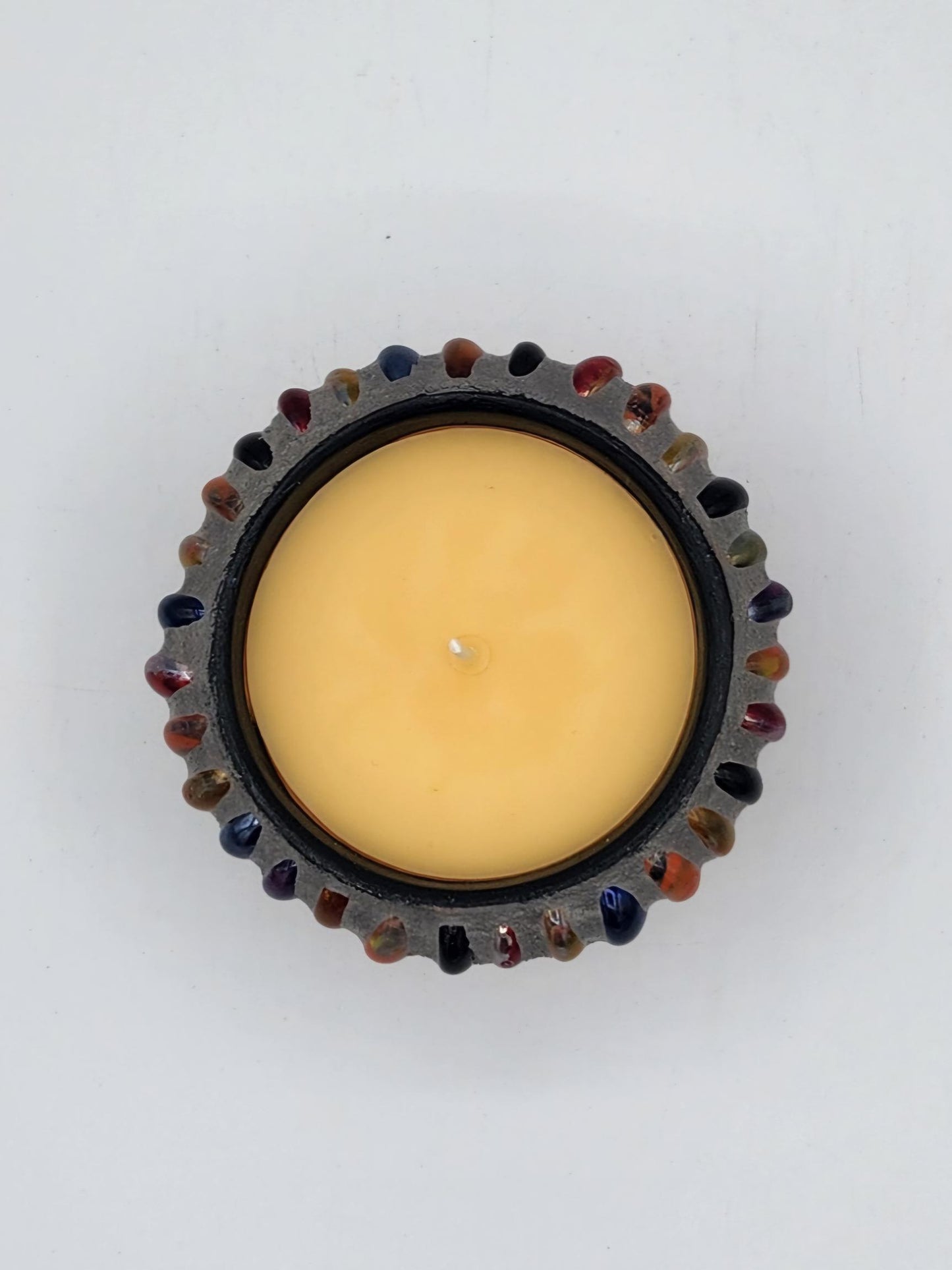 Small mosaic pot with candle