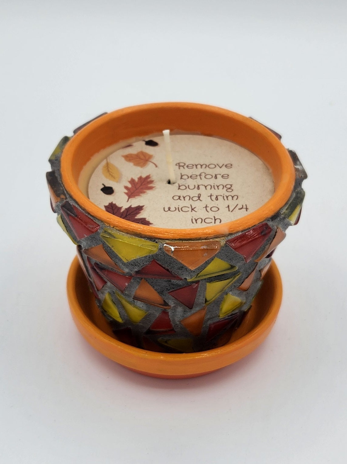 Small mosaic pot with candle