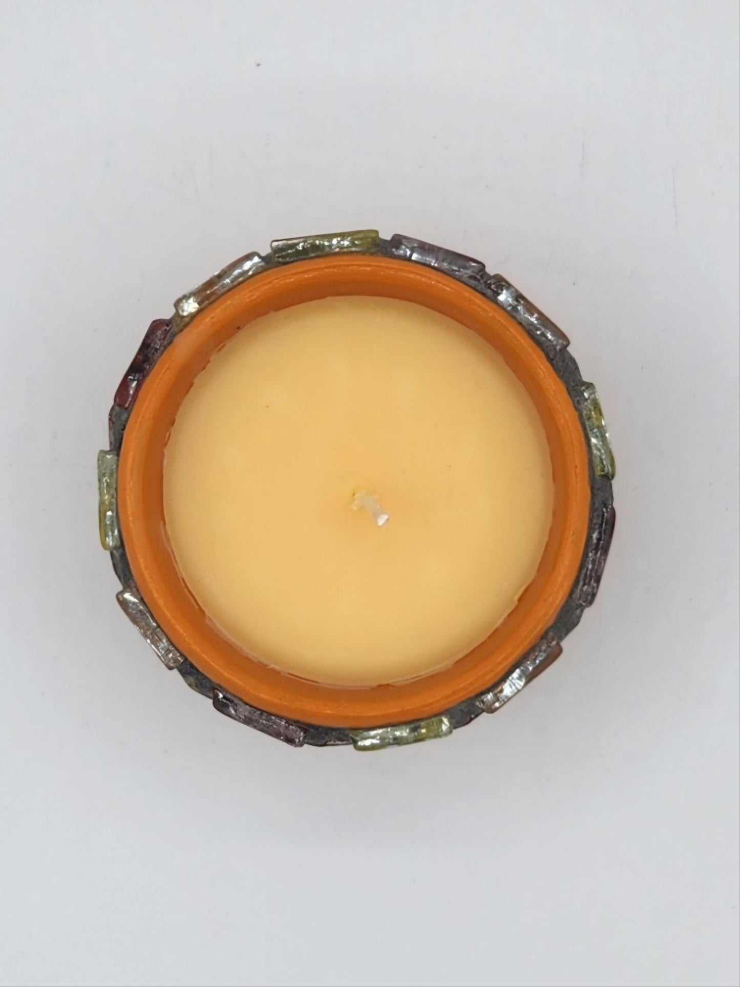 Small mosaic pot with candle