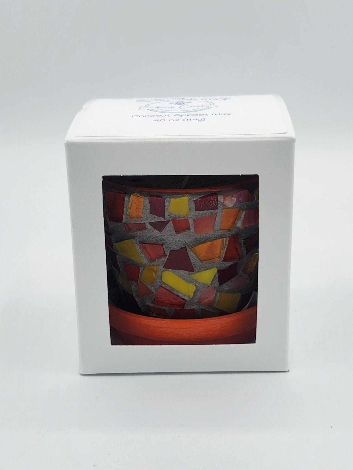 Small mosaic pot with candle