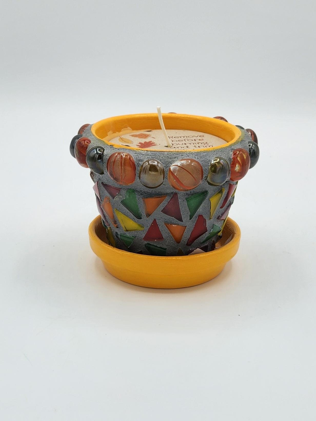 Small mosaic pot with scented candle,