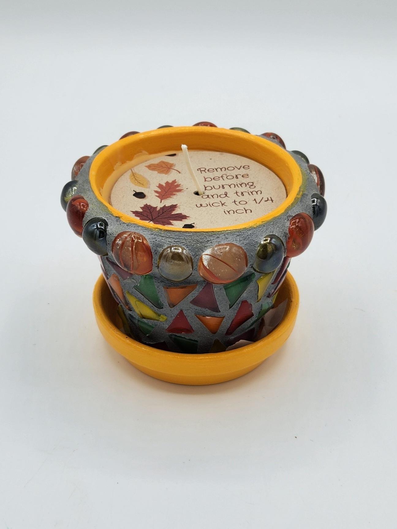 Small mosaic pot with scented candle,