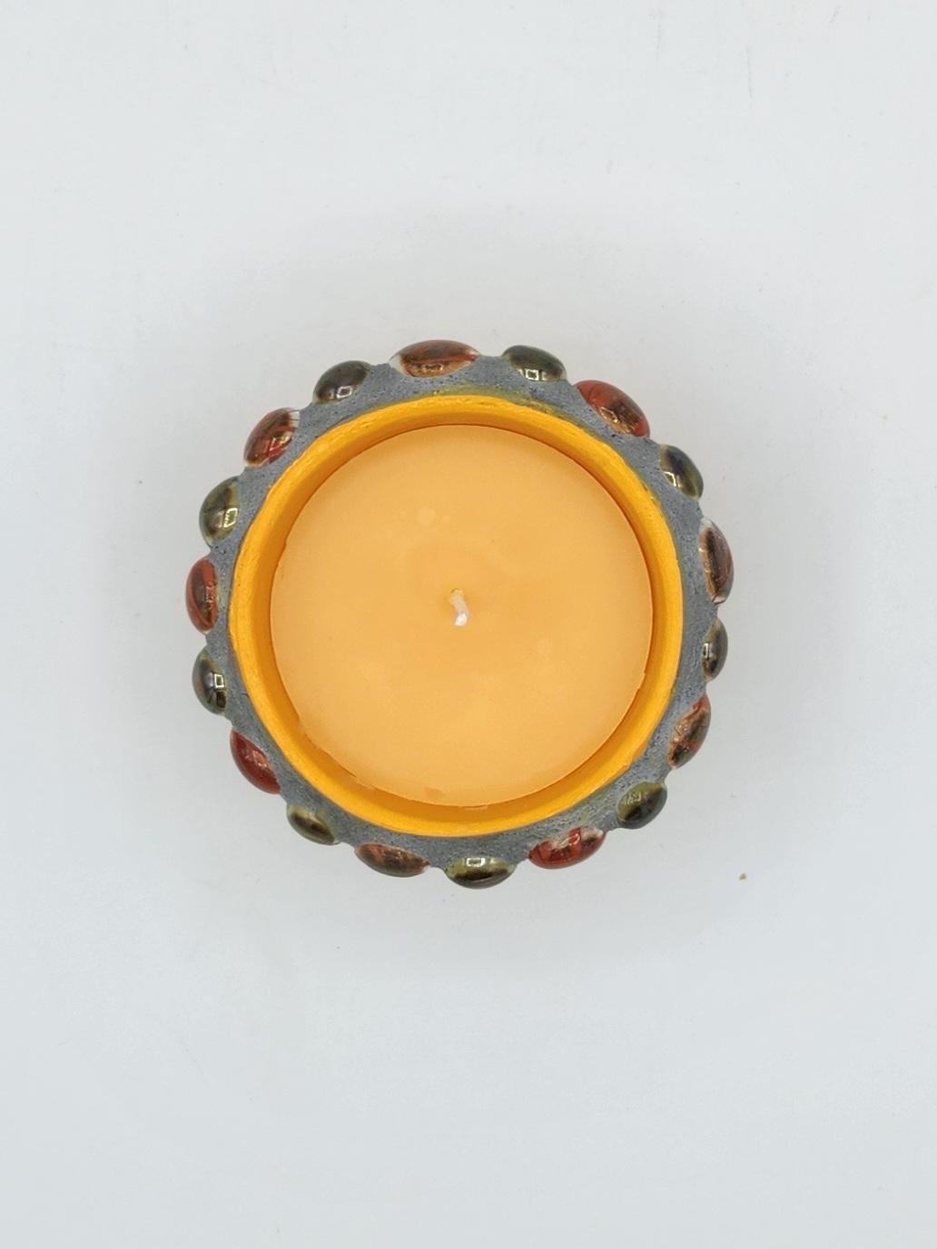 Small mosaic pot with scented candle,