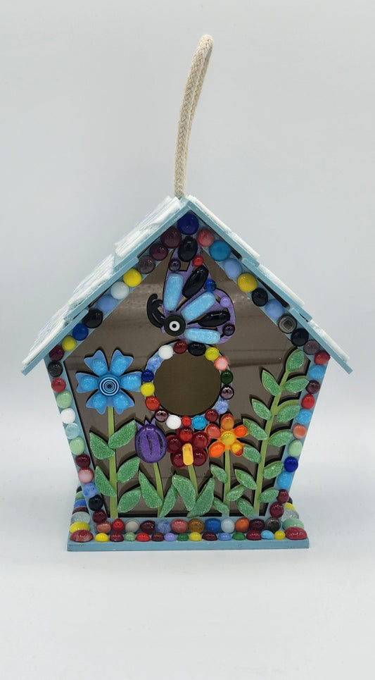 Colorful mosaic birdhouse