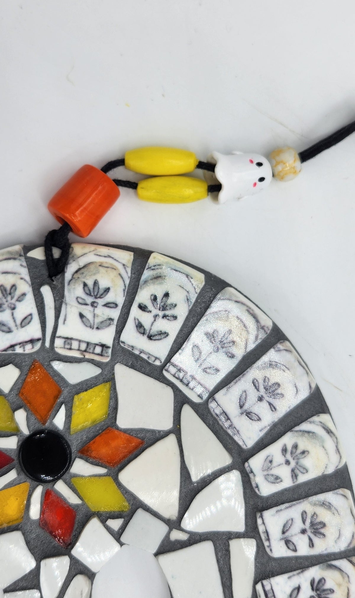 Hanging mosaic ghost