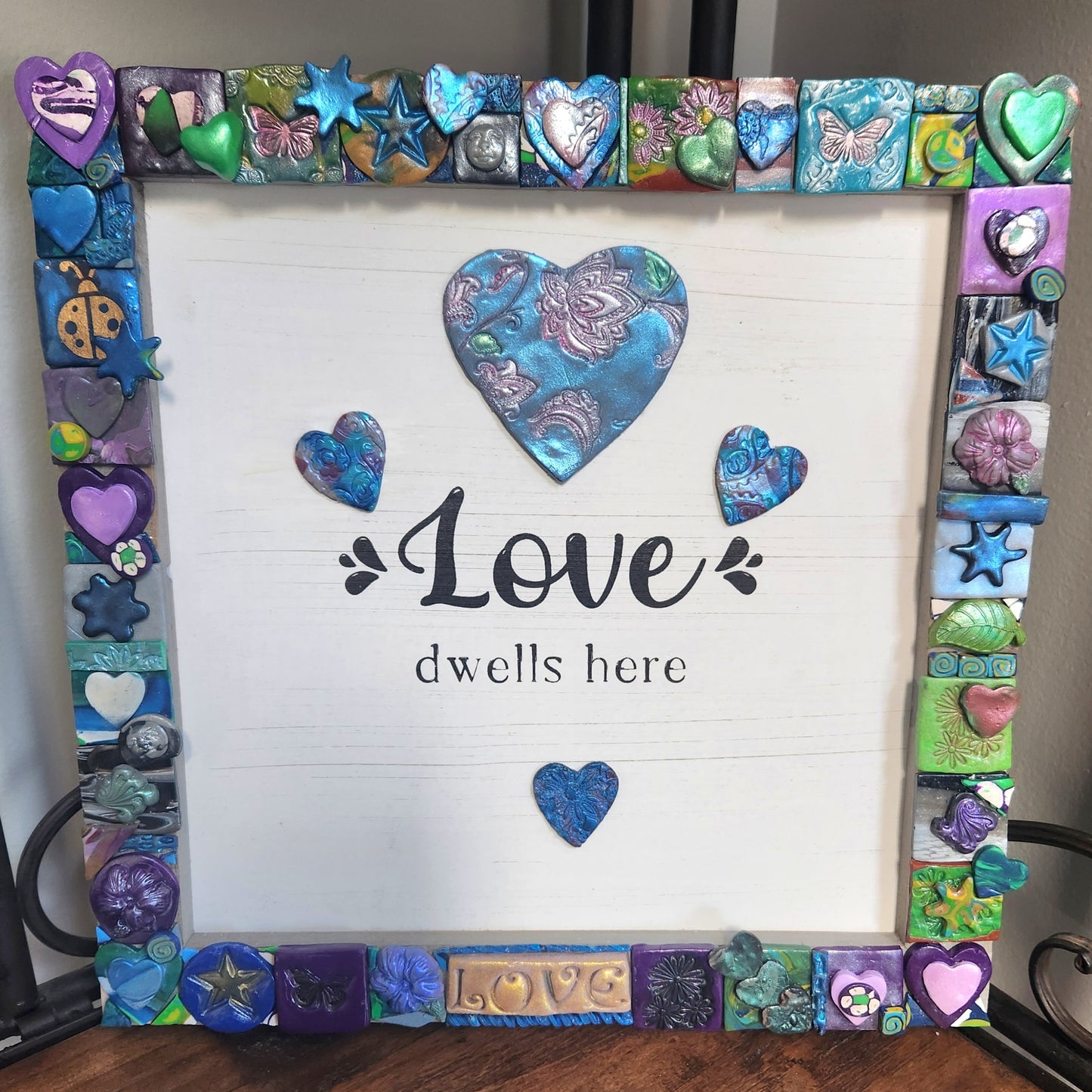 Polymer clay frame with Love.